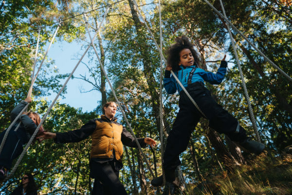 Children playing in obstacle course